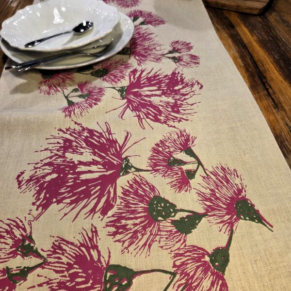 Detail of Australian eucalypt blossoms design on hand screen-printed linen table runner