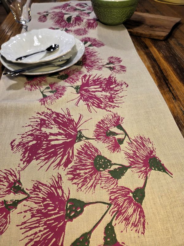 Detail of Australian eucalypt blossoms design on hand screen-printed linen table runner